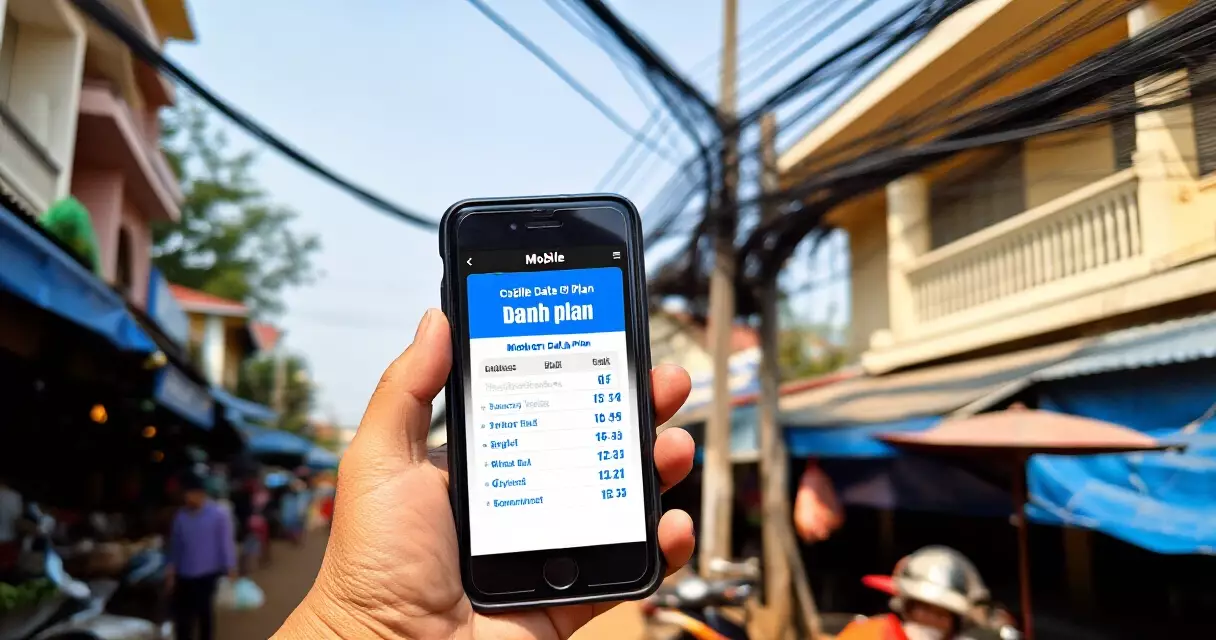 ដៃ​កាន់​ទូរស័ព្ទ​បង្ហាញ​កញ្ចប់​ទិន្នន័យ​ចល័ត​នៅ​ផ្សារ​កម្ពុជា