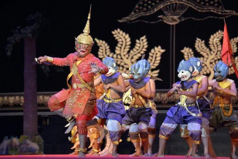 Vibrant traditional Khmer dance performance in Phnom Penh, showcasing cultural costumes and masks.